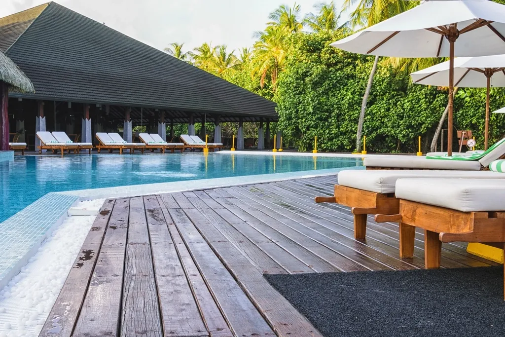 Resort pool deck with sun loungers